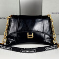 DOWNTOWN SHOULDER BAG 29 IN BLACK WAXED SHEEPSKIN GOLD HARDWARE