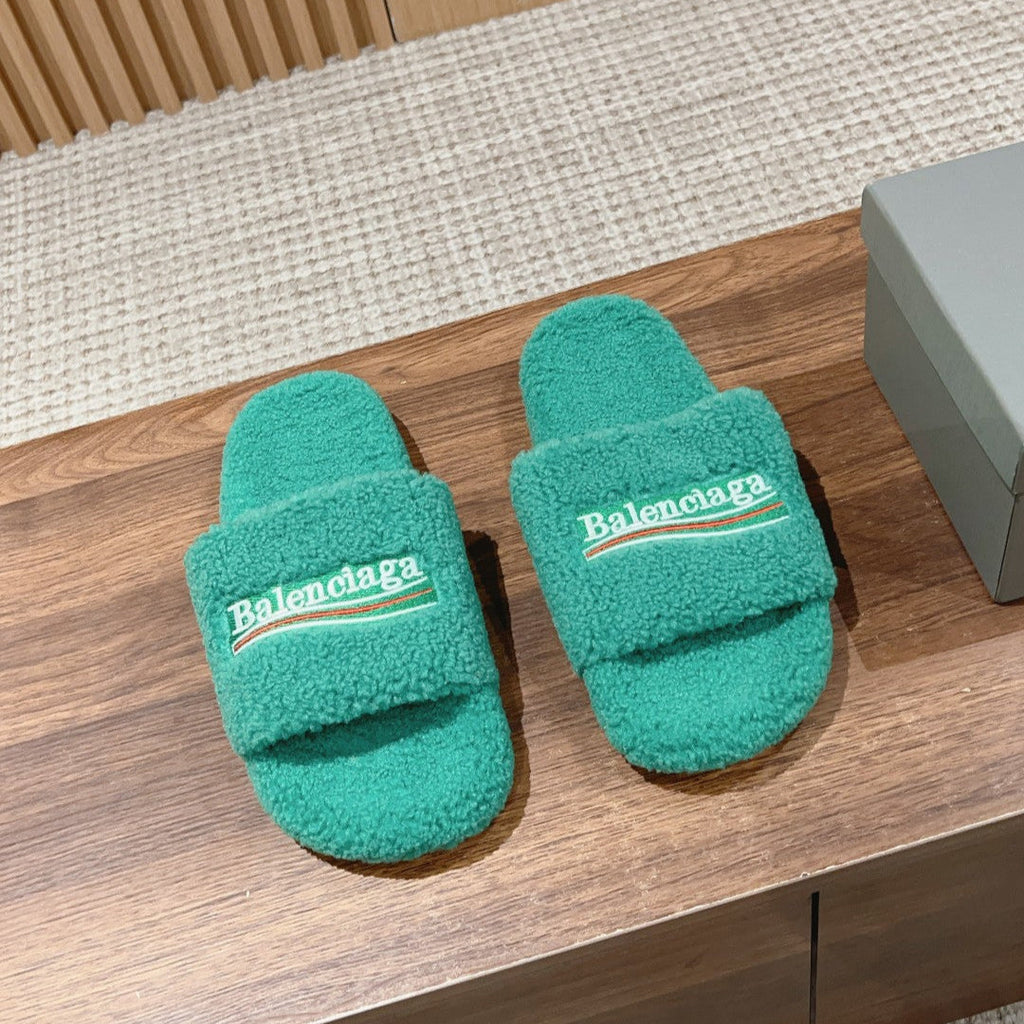 FURRY SLIDES IN TURQUOISE CURLY SHEARLING