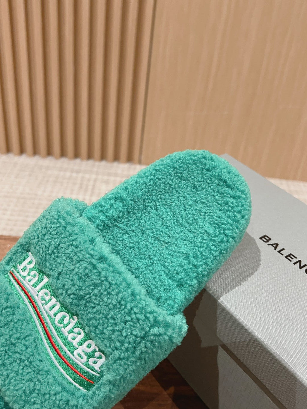 FURRY SLIDES IN TURQUOISE CURLY SHEARLING