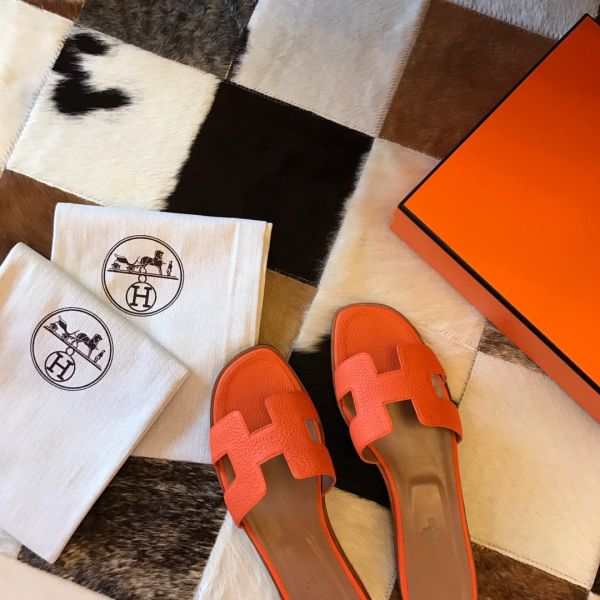 HERM Oran Slide Sandals In Orange Clemence Leather