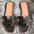 HERM Oran Sandals In Black Ostrich Leather