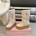 SNOW LONG BOOTS IN COSMIC LATTE SHEARLING