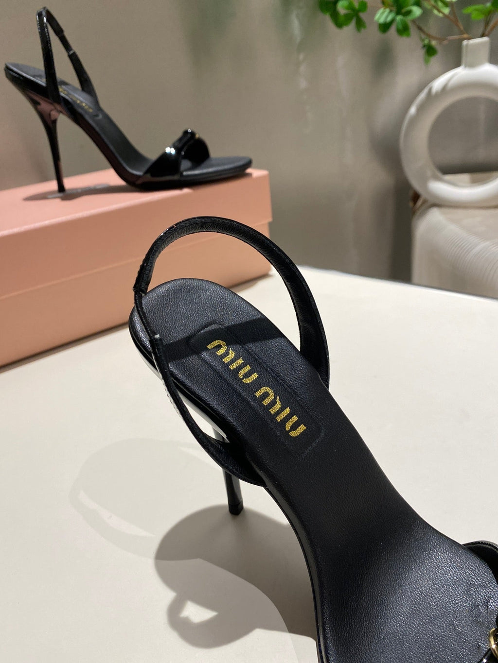 TWO STRAP HIGH HEELED SANDALS IN BLACK GLOSSY SHEEPSKIN