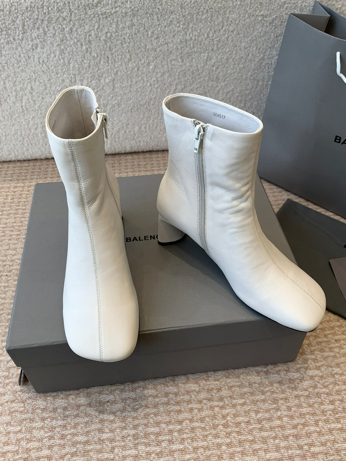 ANKLE BOOTS IN WHITE LOGO EMBOSSED SOFT SHEEPSKIN