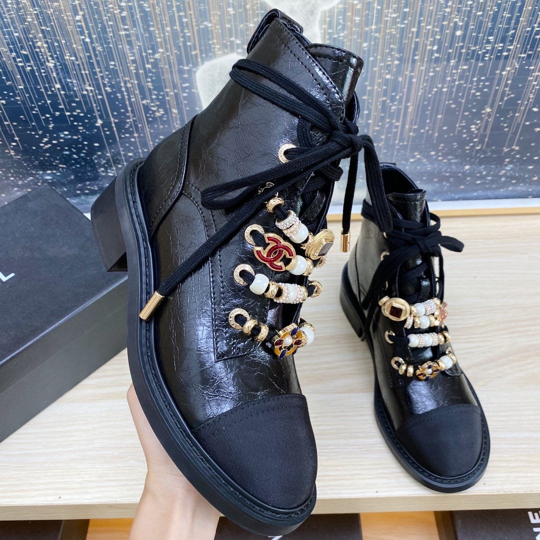 CC COMBAT BOOTS IN BLACK WRINKLED CALFSKIN AND GROSGRAIN WITH FAUX PEARL