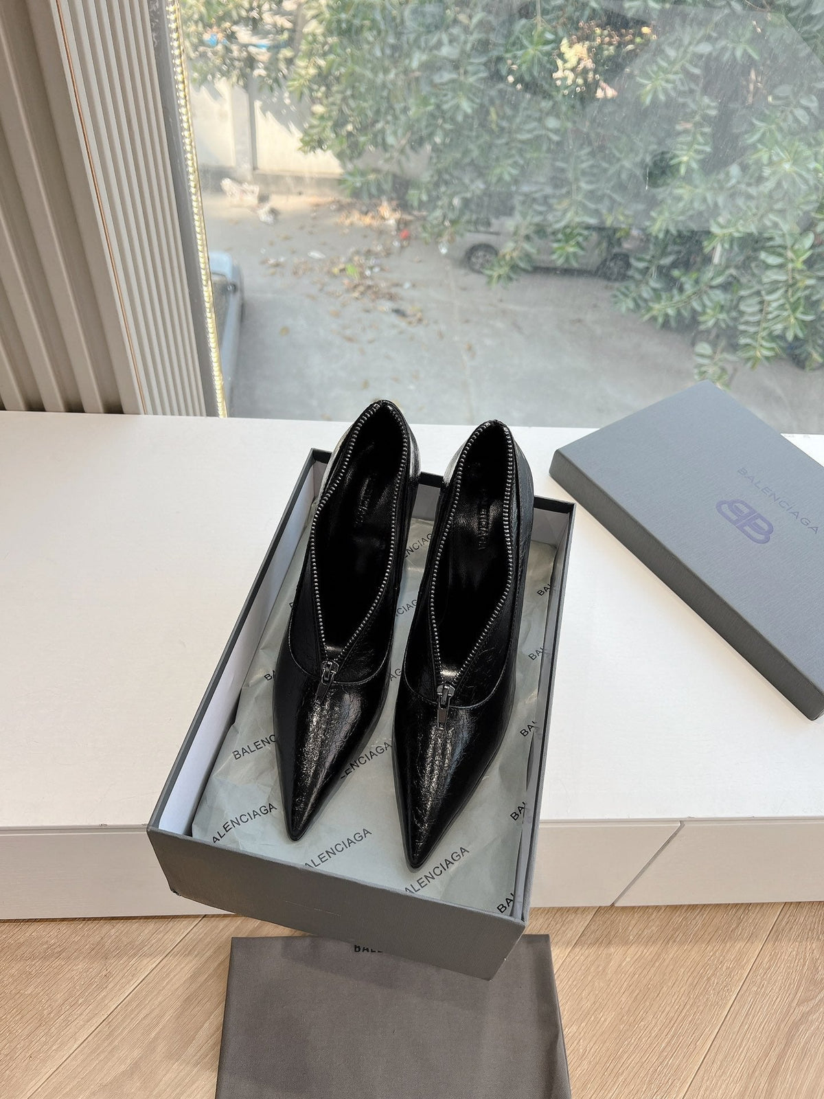 ZIPPER POINTED-TOE HIGH PUMPS IN BLACK WAX-OIL SHEEPSKIN