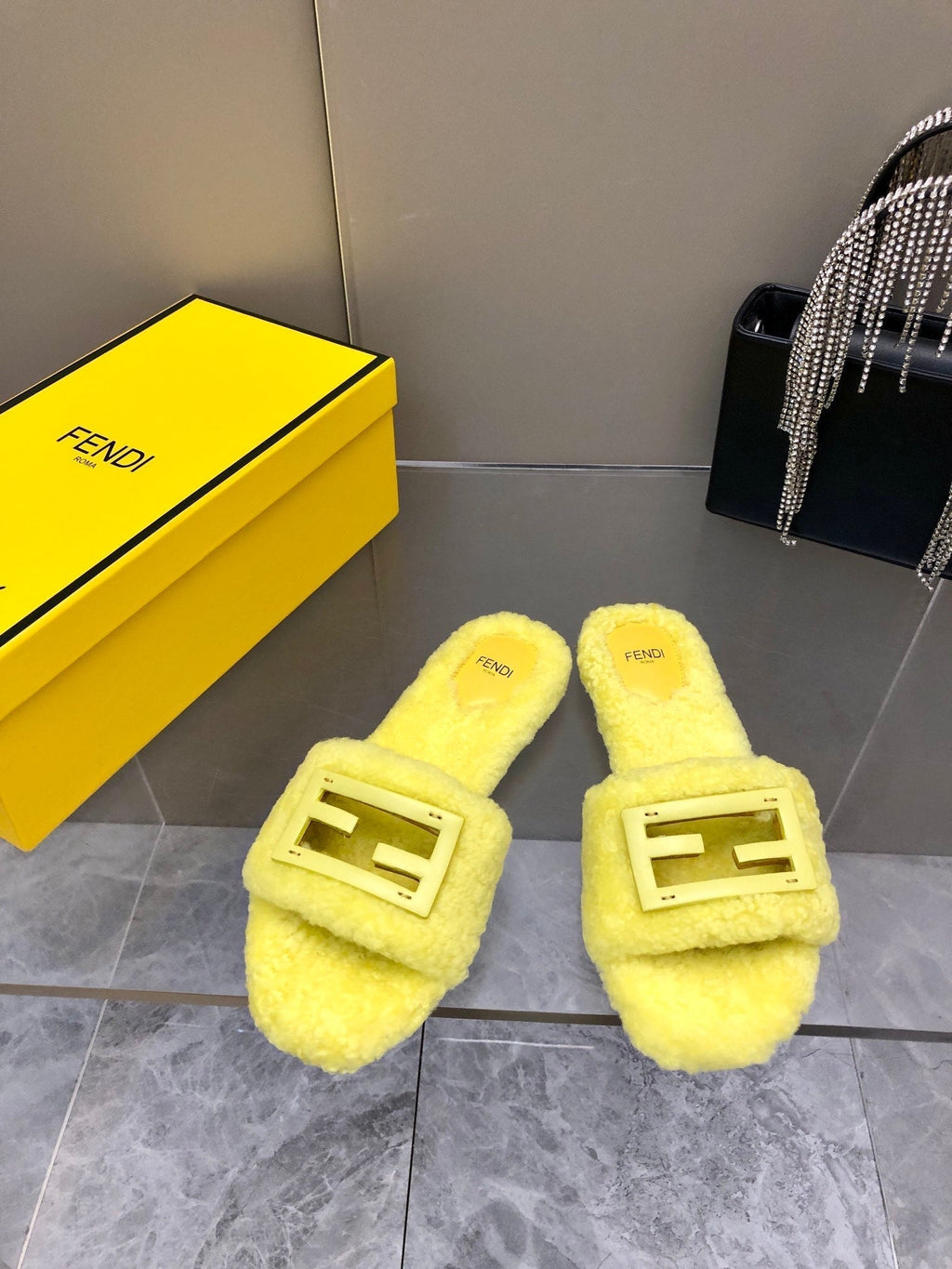 FENDI BAGUETTE SLIDE SLIPPERS IN BRIGHT YELLOW WOOL