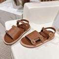 FLAT SANDALS IN RUST BROWN TRIOMPHE EMBOSSED SMOOTH CALFSKIN