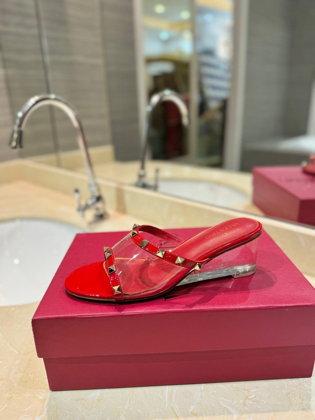 ROCKSTUD MULE SANDALS IN CHERRY RED CALFSKIN AND TRANSPARENT PVC FILM