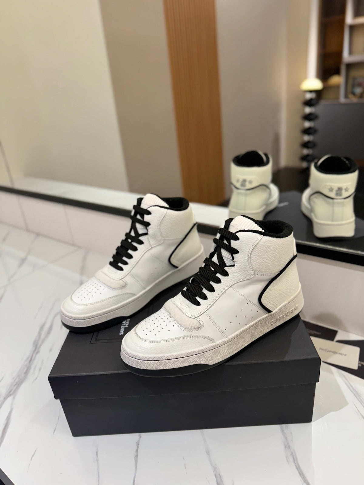 MID-TOP SNEAKERS IN WHITE AND BLACK TRIM PERFORATED LAMBSKIN
