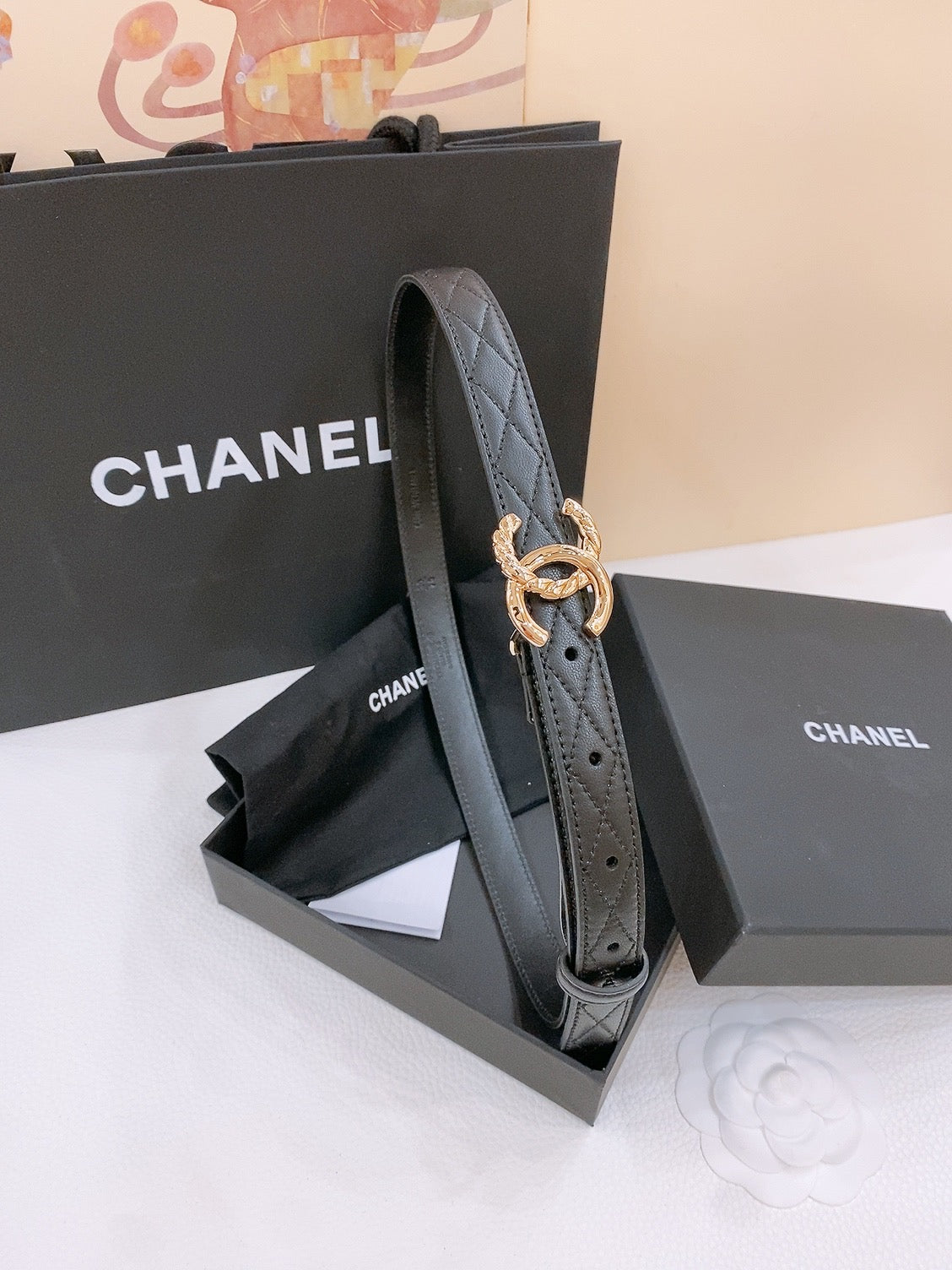 DOUBLE C BELT 20MM IN BLACK CALFSKIN WITH QUILTED STITCHING AND SPIRAL GOLD BUCKLE